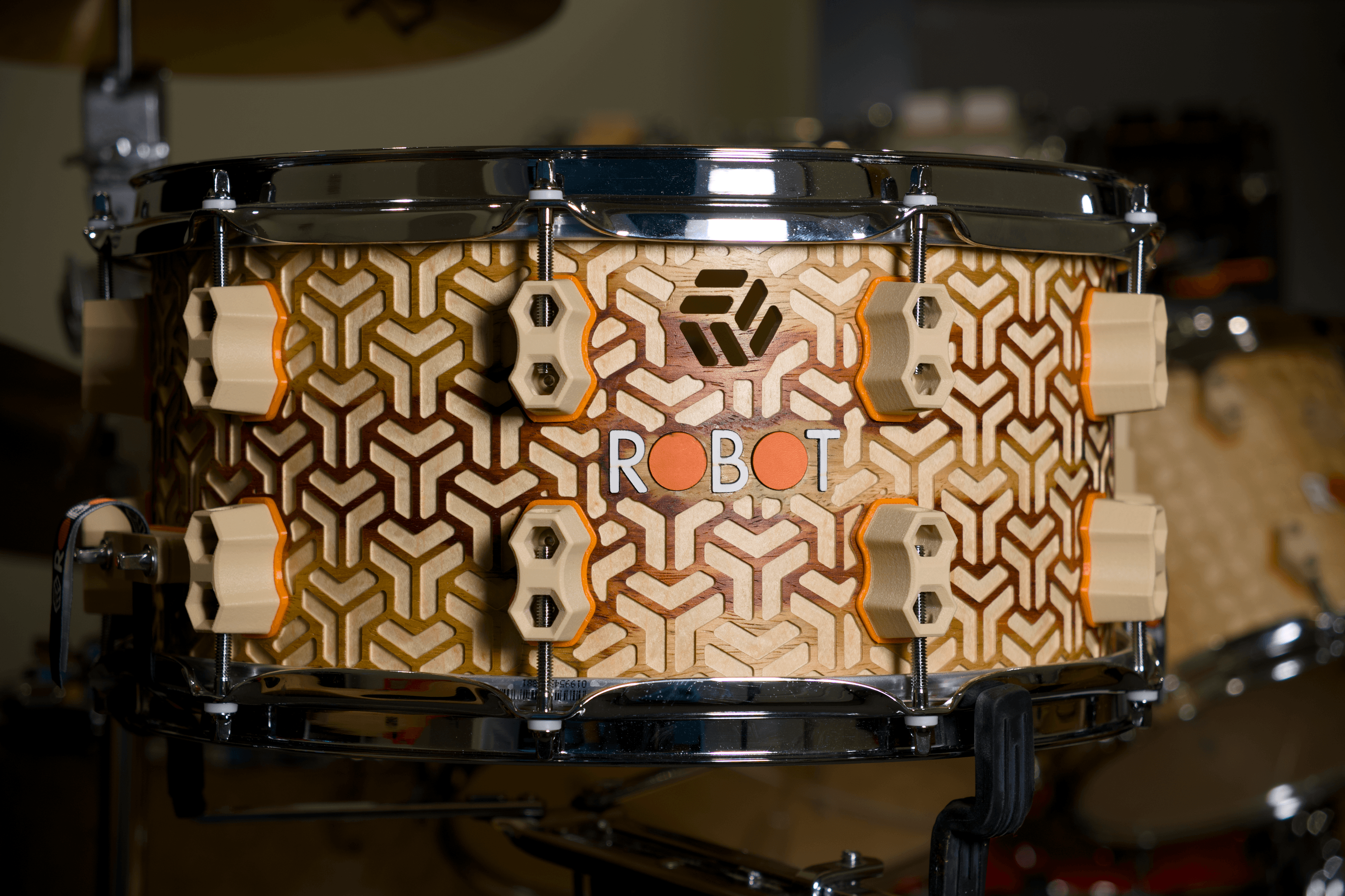 Limited build snare with tri-hex shell geometry and warm natural finish.